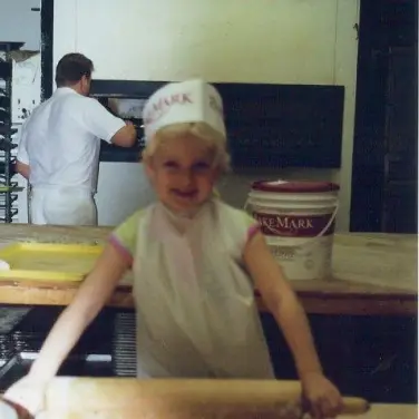 Steve's daughter, Lisa, making cookies at the bakery